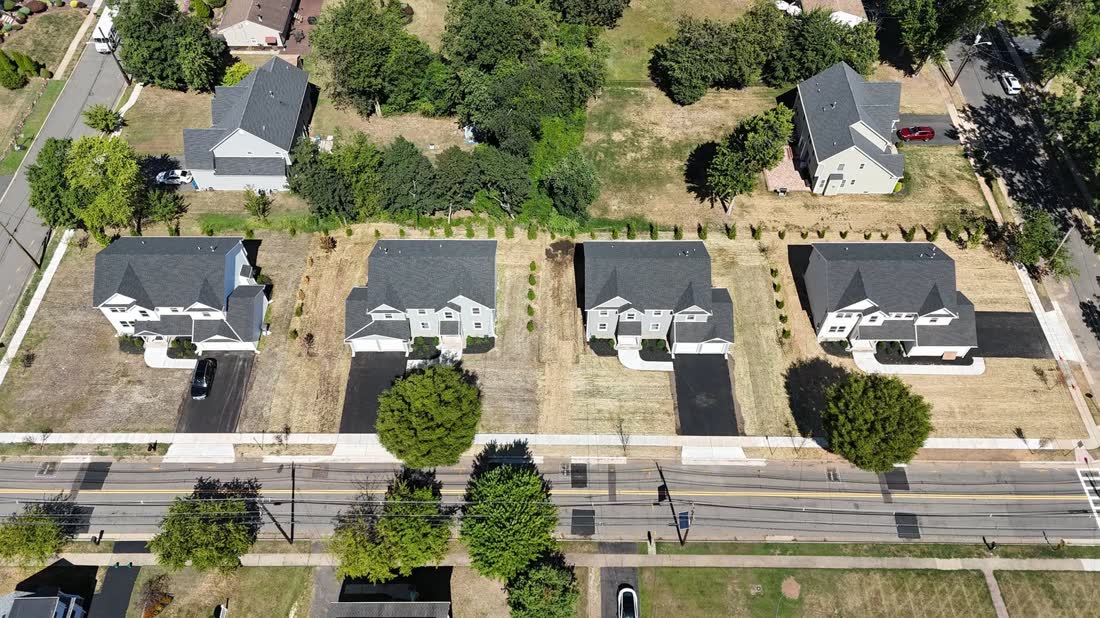 Aerial view of a commercial site with new homes